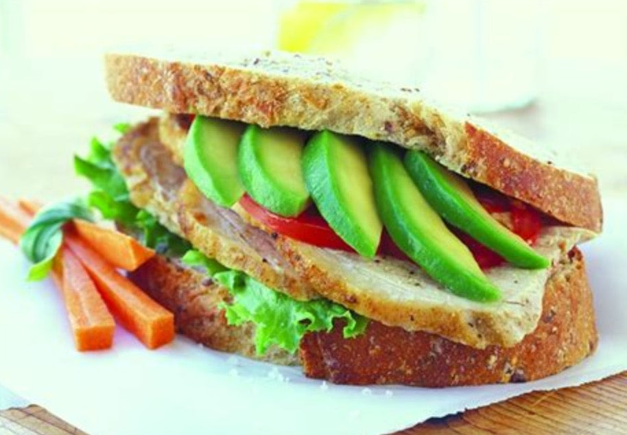 Turkey, cranberry, mixed lettuce and avocado sandwich
